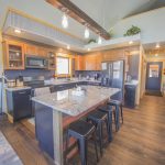 Kitchen with grey marble counters and island