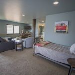 Spare bed with contemporary art